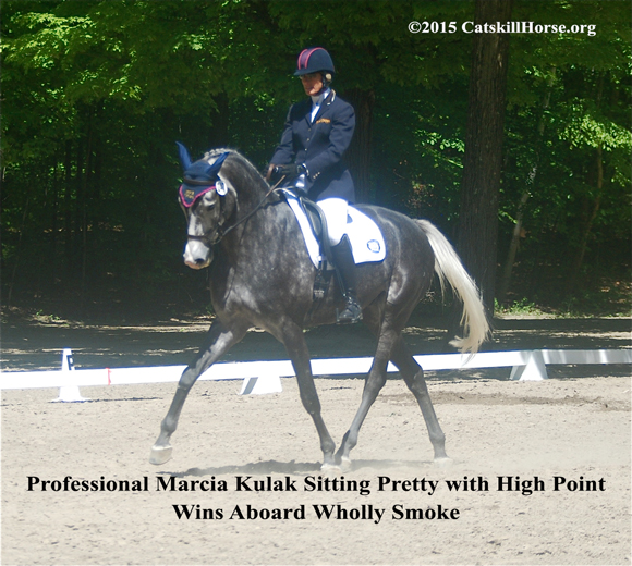 Marcia Kulak riding Wholly Smoke
